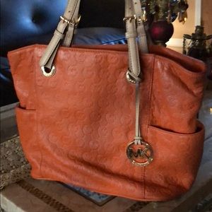 Michael kors orange leather purse